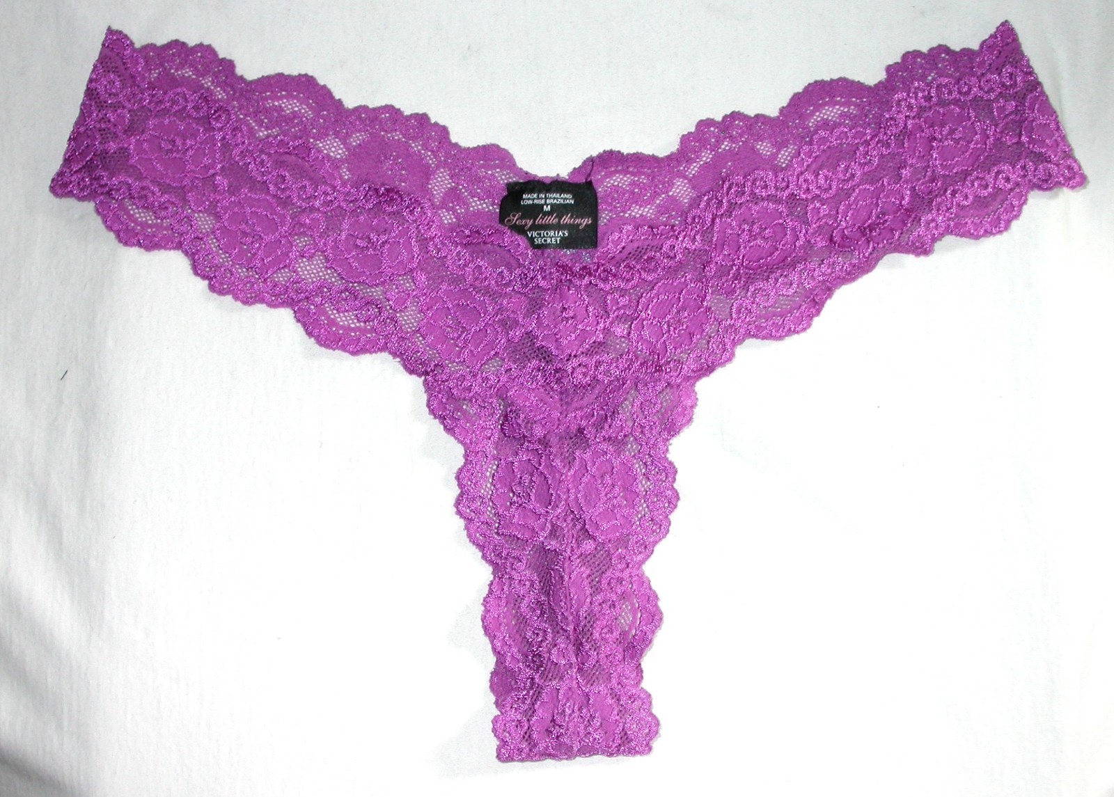 NWOT Victoria’s Secret Sexy Little Things Thong Size M Purple Lace Bows in Back