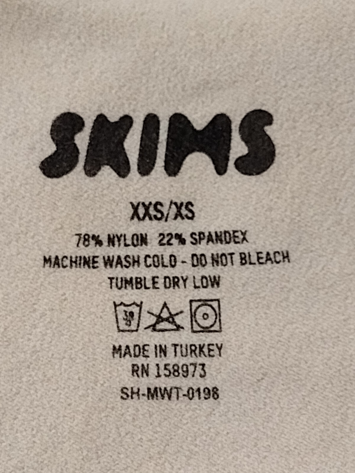 SKIMS Women’s Comfy Sculpting Mid Waist Thong in Beige Size XXS/XS SH-MWT-0198