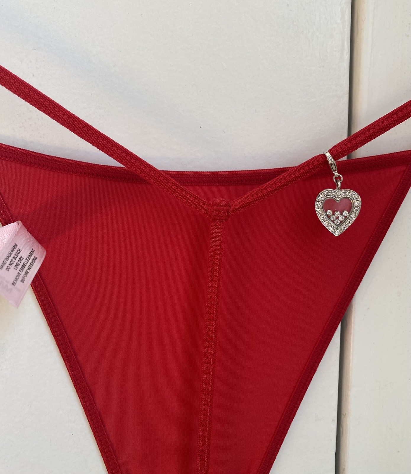 Victoria’s Secret Red Thong, size M, With Diamond Heart Charm, very nice !