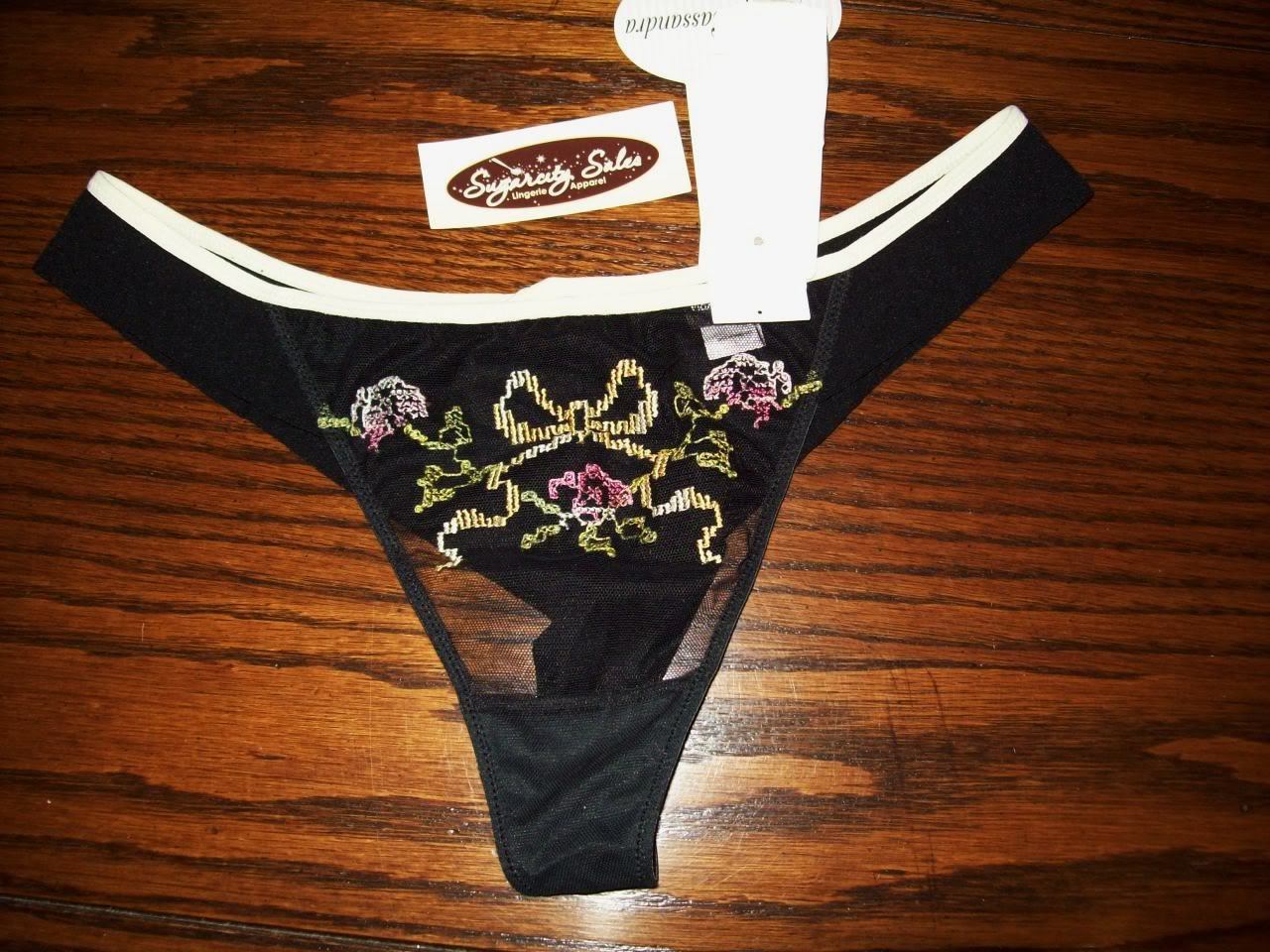 NWT CASSANDRA SHEER MESH FRONT w SAMPLER EMBROIDERY THONG PANTIES BLACK 50879 L