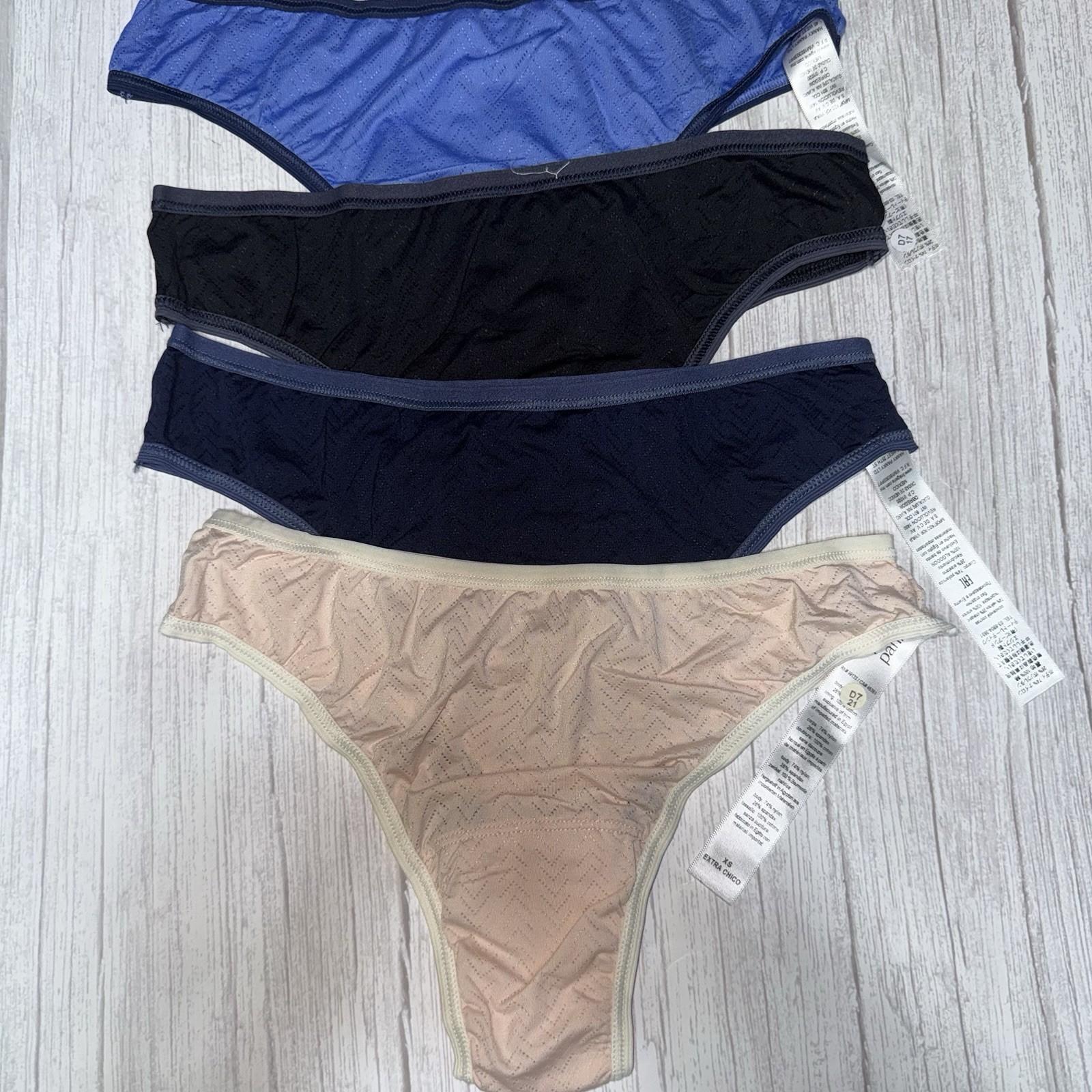 Hanky Panky Women’s MoveCalm™ Natural Rise Thongs in a 4-pack assortment