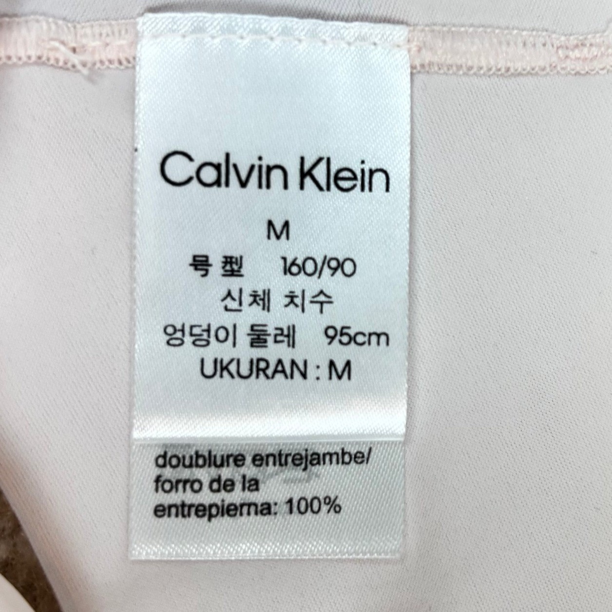 Calvin Klein Invisibles Micro Thong Pale Pink Seamless No-Show Panty Size M NEW