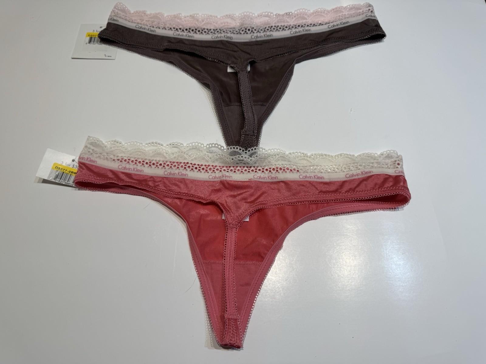 NWT 2 Pairs Calvin Klein Thong Panties Size Medium Style D3377 Multicolor