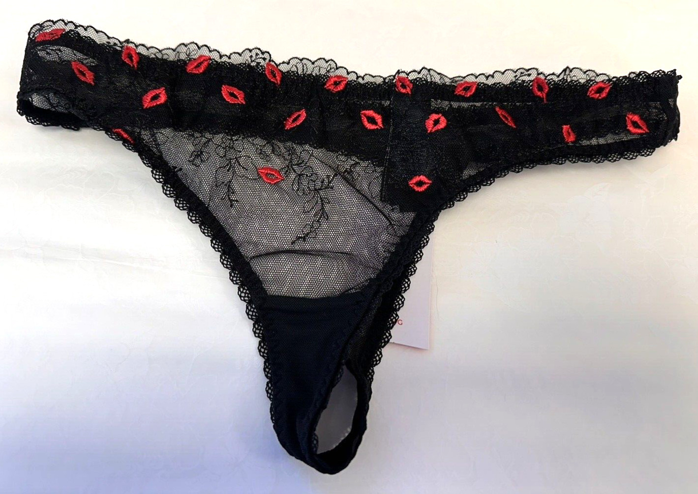 NEW! M&S Boutique Marks & Spencer black mesh thong with red lip embroidery