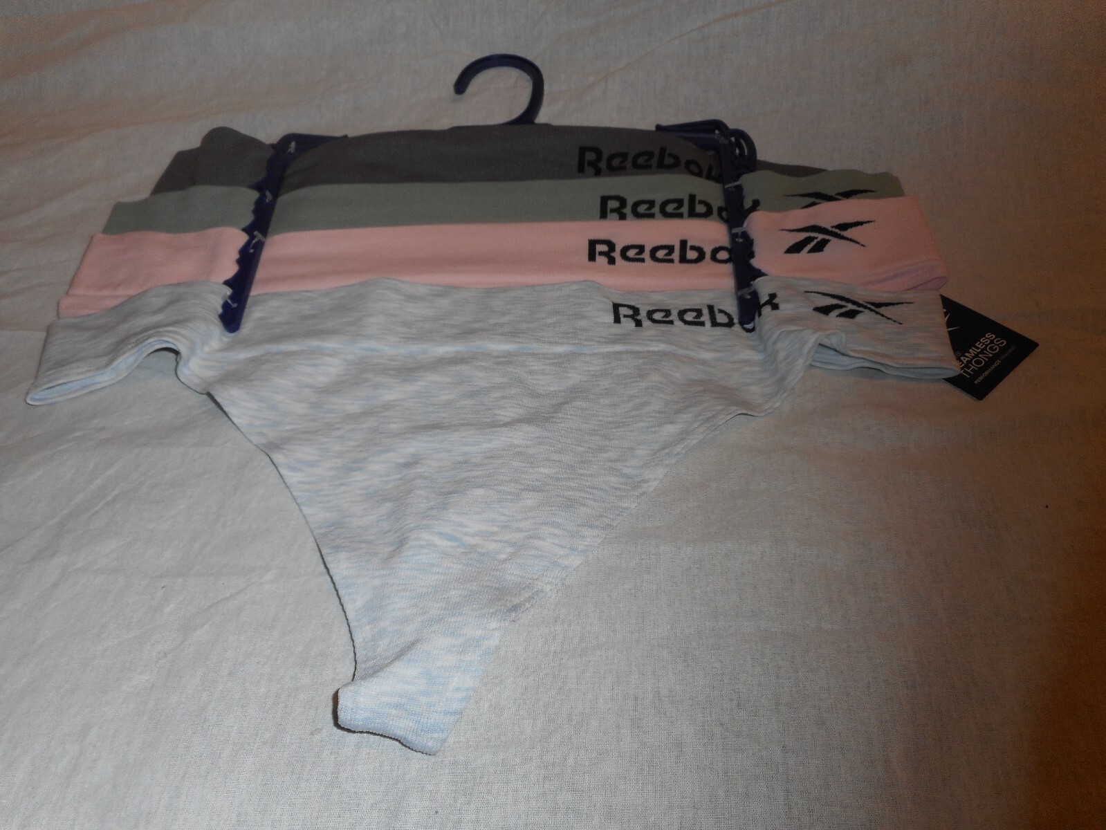 4 Pack Reebok Multi Color Extra Large & Large Seamless Thong Panty
