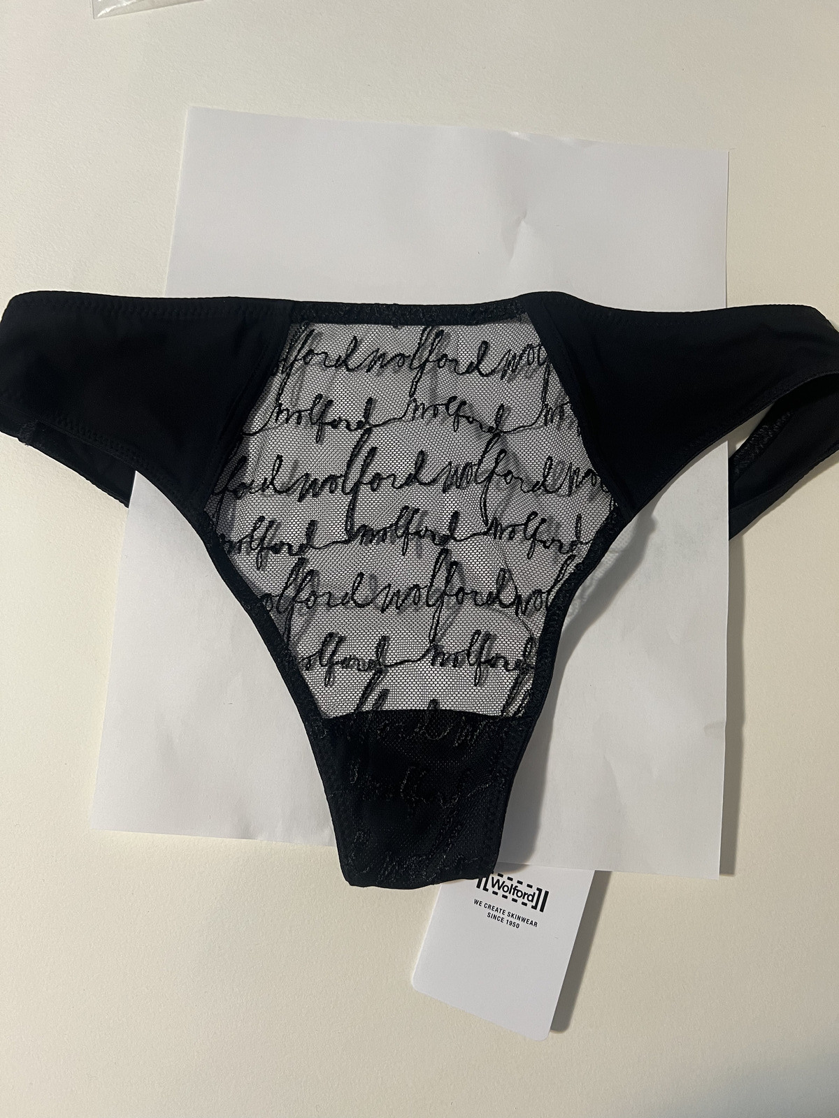 Wolford embroidered logo obsessed tulle Black Med string thong panty Retail $80