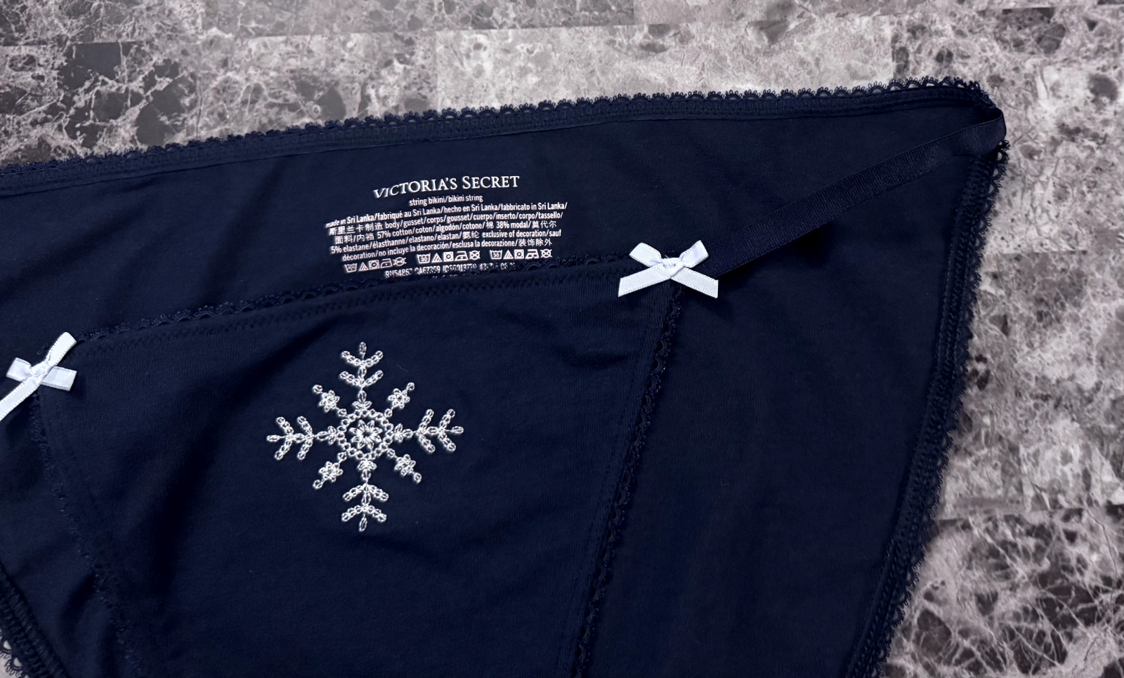 VICTORIA’S SECRET NAVY BLUE EMBROIDERED SNOWFLAKE PICOT STRING BIKINI PANTIES