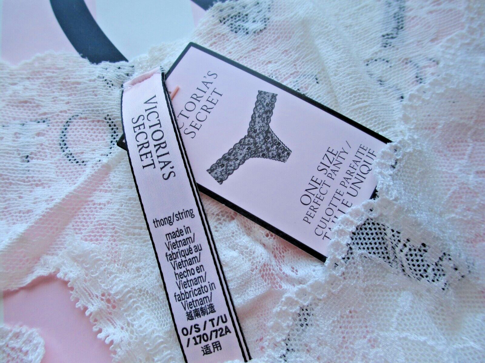 VICTORIA’S SECRET Thong Panty ONE SIZE Fits M L Coconut White NWT Lace VS