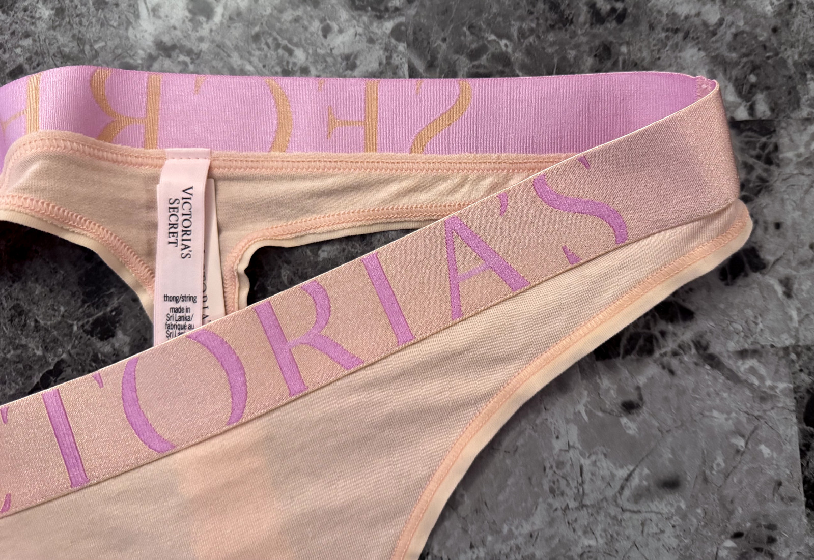 NWT VICTORIA’S SECRET PEACH LILAC THICK EXPLODED LOGO WAISTBAND THONG PANTIES