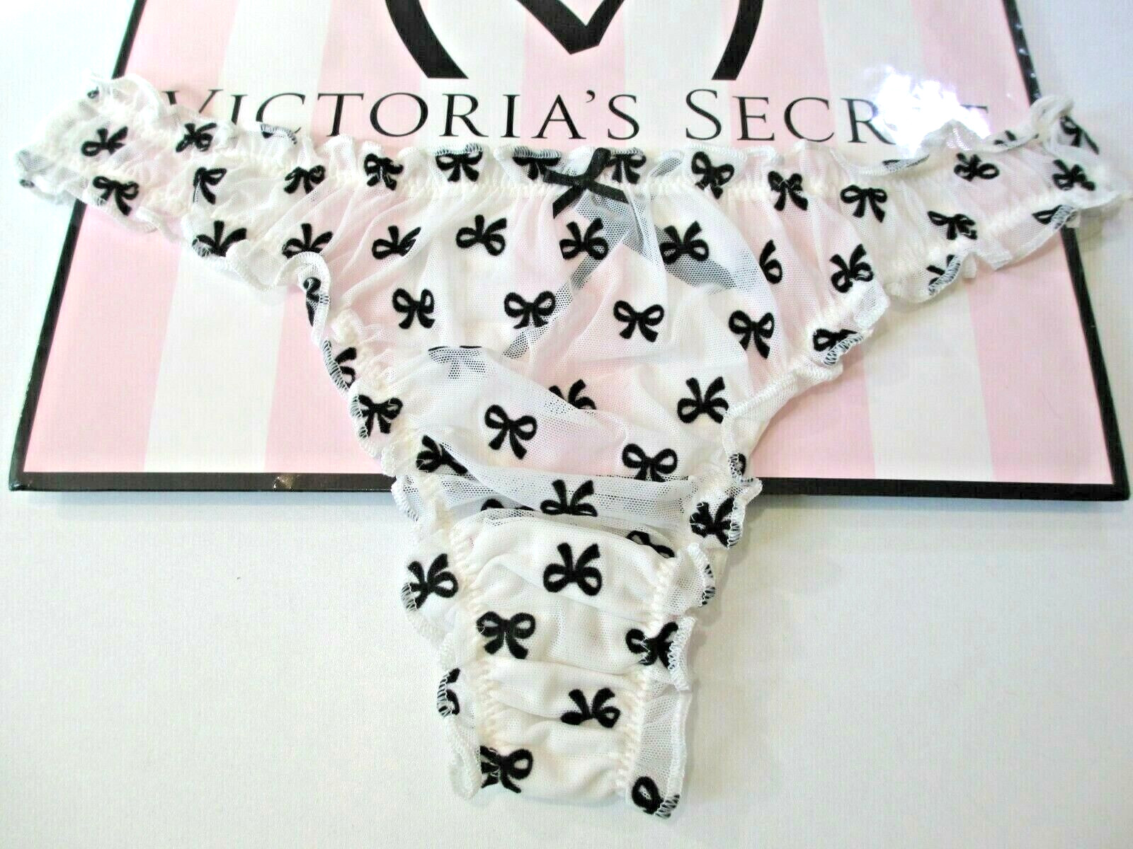 VICTORIA’S SECRET DREAM ANGELS Thong Panty XL White NWT Black Bow Ruffle Flutter