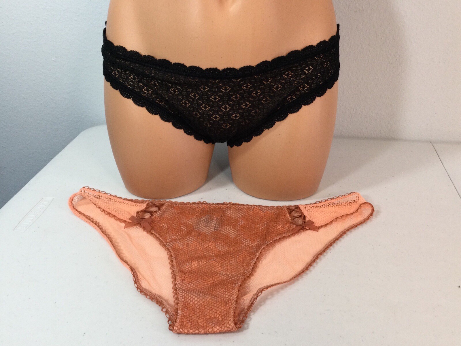 VICTORIA’S SECRET Lot Of TWO Black & Orange/Rust Cheekini Panties. Size Med. NEW
