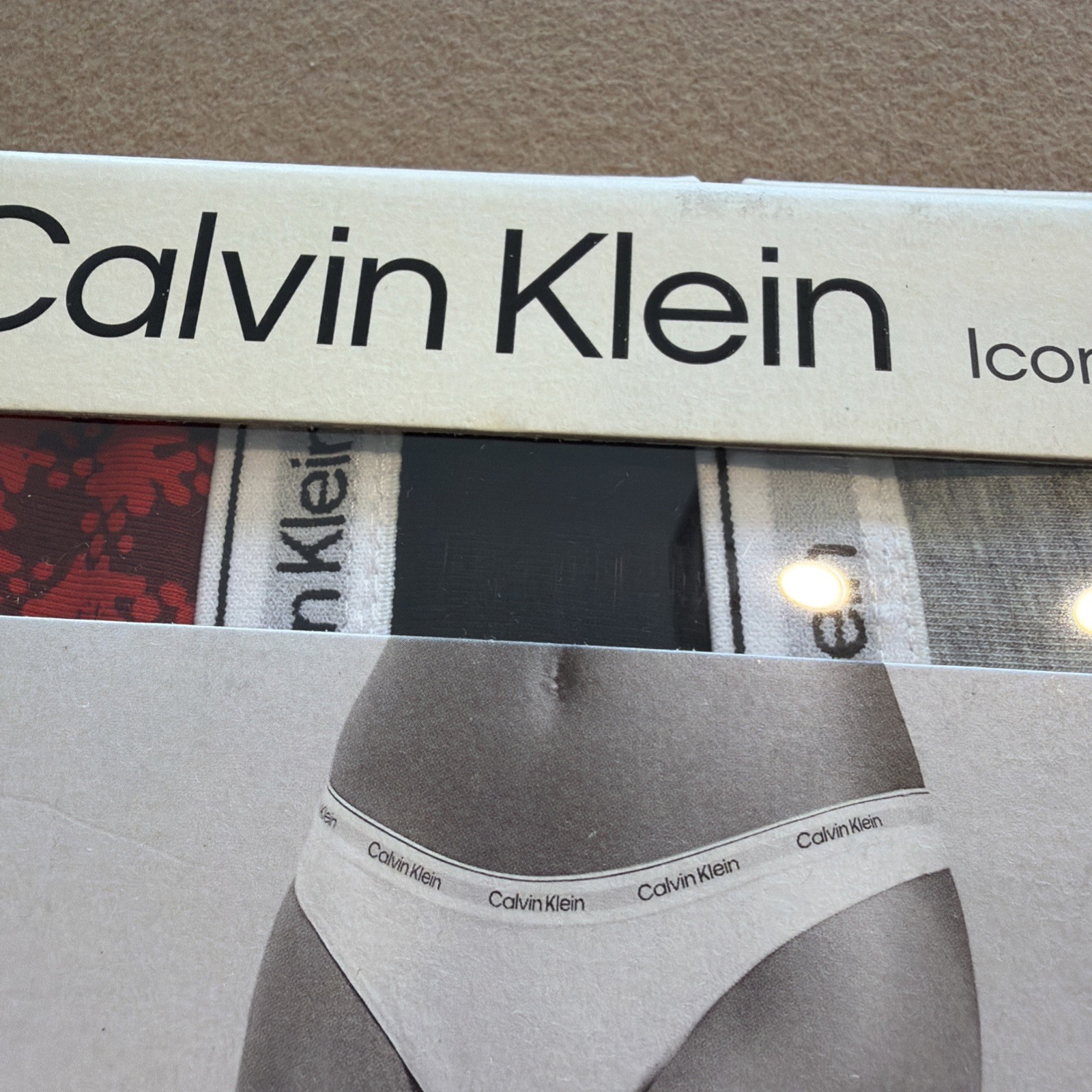 Calvin Klein Icon Logo 3-pack thongs in black/gray/red tartan Large